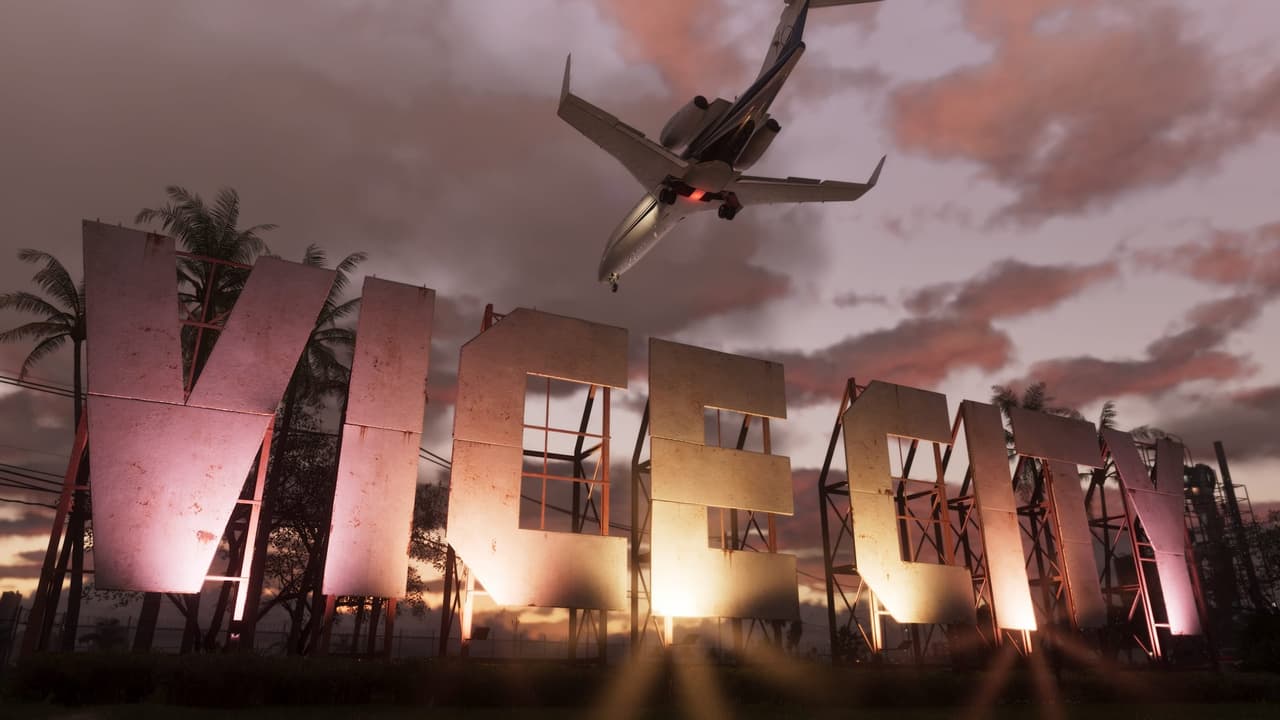 Letras de Vice City al atardecer con un avión sobrevolando